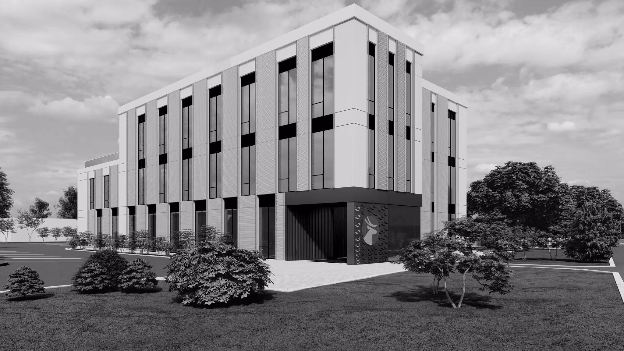 Modern commercial building architecture, a black and white, showcasing sleek design, large windows, and landscaped grounds.