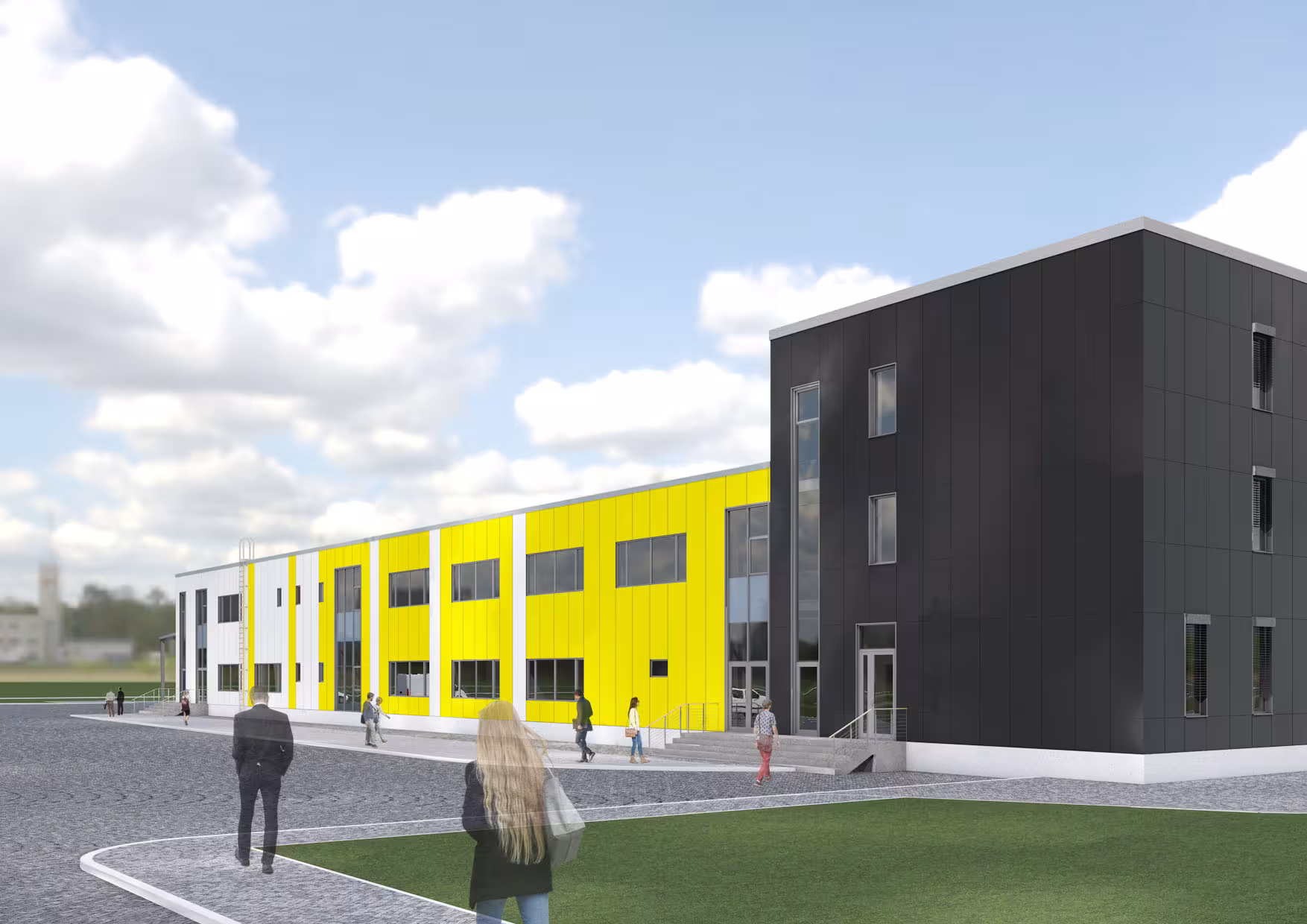 Side view of the production facility featuring color-coded yellow vertical accents against a white and dark grey facade for visual rhythm.