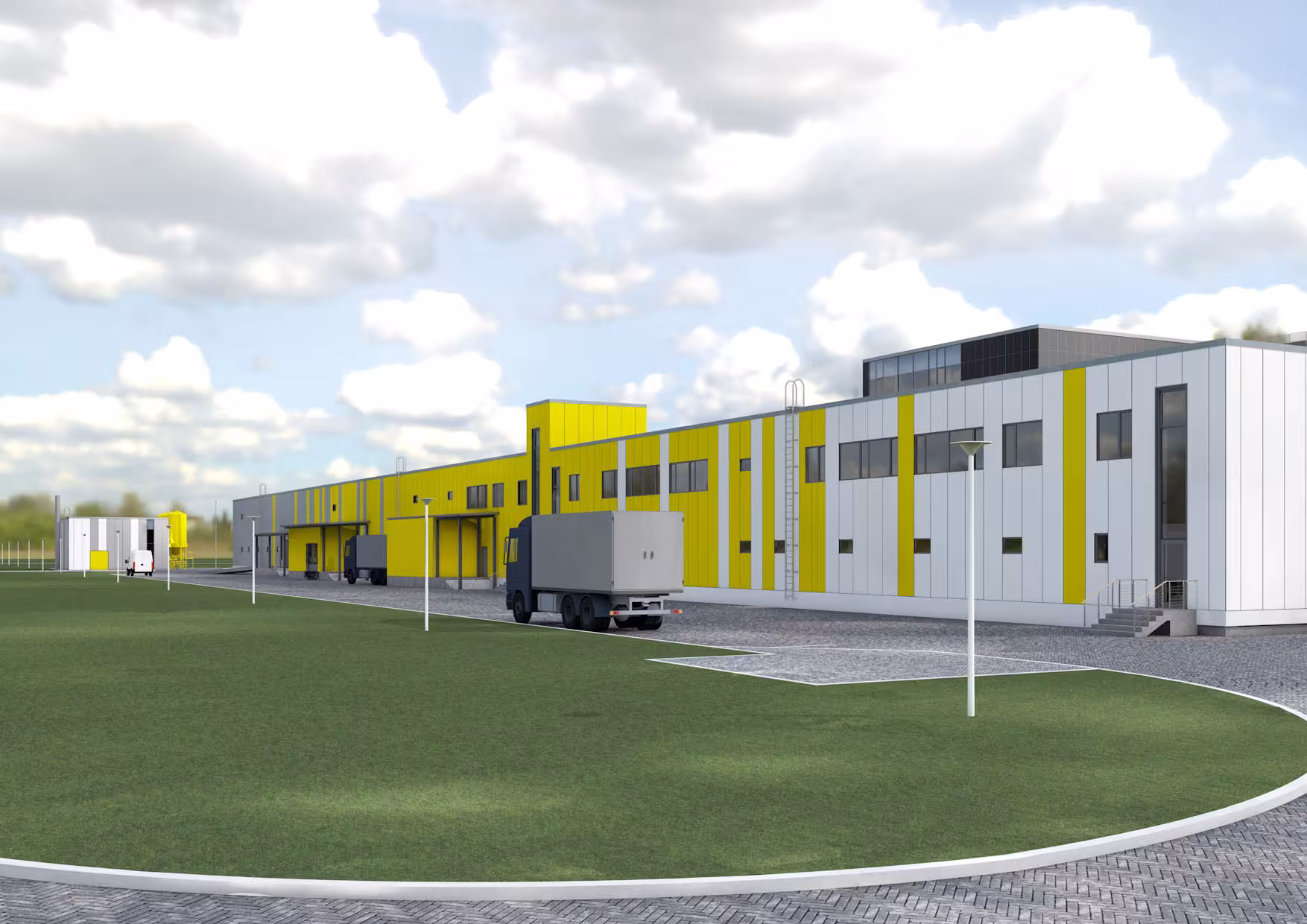 Logistics and loading area of the 30,000 sqm complex, highlighting the yellow color-coded production wing and organized transport infrastructure.