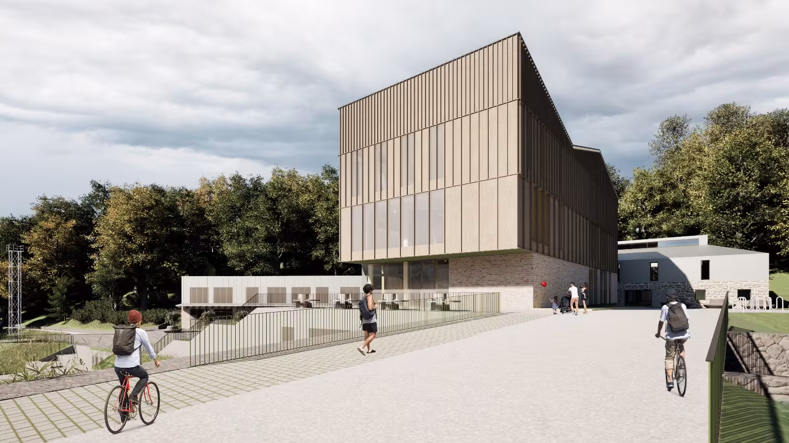 Exterior of the multi-functional public building in Smiltene, showcasing sustainable prefabricated timber construction and a brick base that honors the site's history.