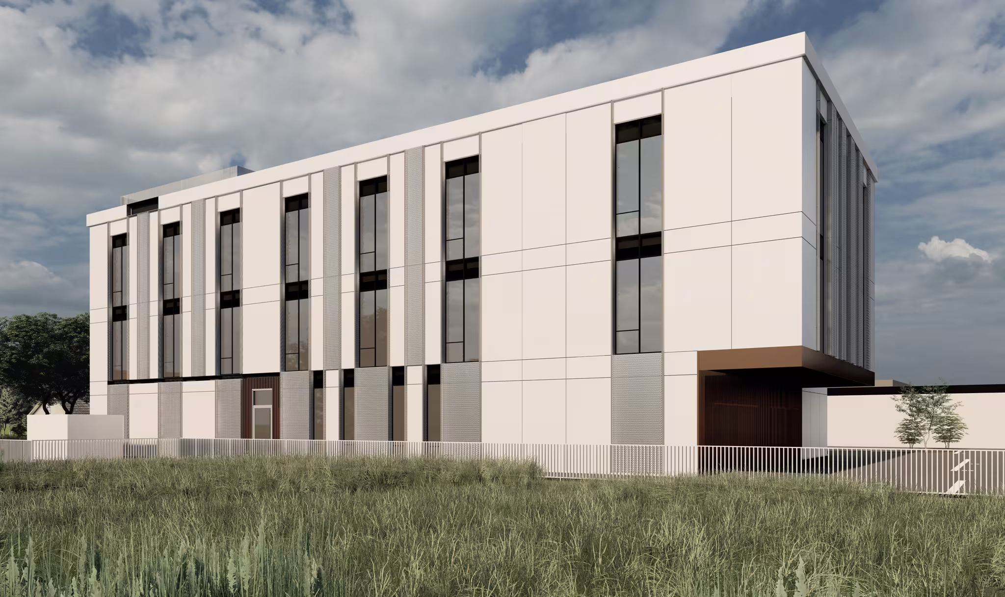 Modern VIADA office building side view with white panel façade, vertical windows and grey shading screens, grass landscape in foreground