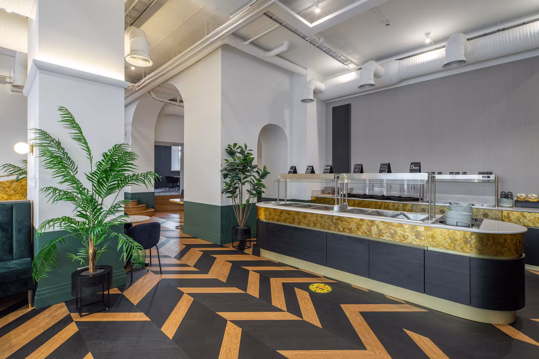 Riverside SPA Hotel's modern breakfast buffet, featuring a distinctive chevron floor.